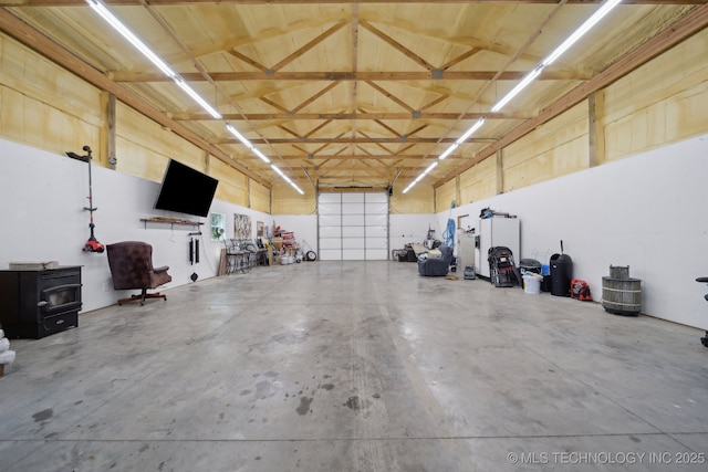 27108 E 82nd St S, Broken Arrow, OK 74014 - garage with a wood stove