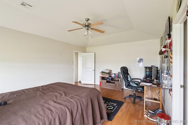 14507 E 110th Pl, Owasso, OK 74055 - bedroom with wood finished floors, a desk, and lofted ceiling