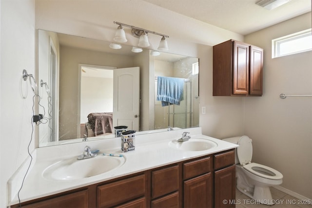 14507 E 110th Pl, Owasso, OK 74055 - bathroom with toilet, a shower stall, double vanity, and tile patterned flooring