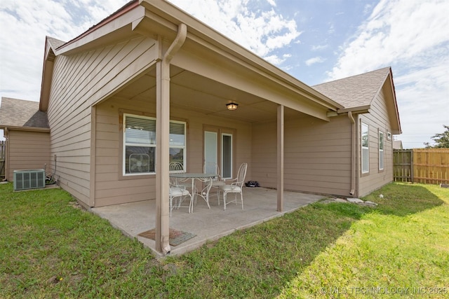 14507 E 110th Pl, Owasso, OK 74055 - rear view of house with central AC unit, a patio, and a shingled roof