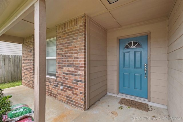 14507 E 110th Pl, Owasso, OK 74055 - property entrance with brick siding and fence