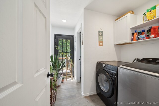 239 Seneca Dr, Sand Springs, OK 74063 - laundry room with cabinet space, washing machine and dryer, light wood finished floors, baseboards, and recessed lighting