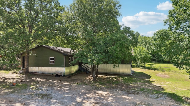 239 Seneca Dr, Sand Springs, OK 74063 - view of yard featuring stairs