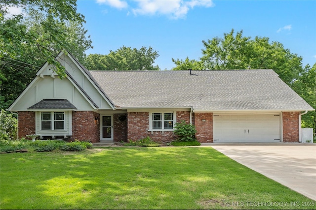 view of front facade with an attached garage, driveway, a front yard, a shingled roof, and brick siding