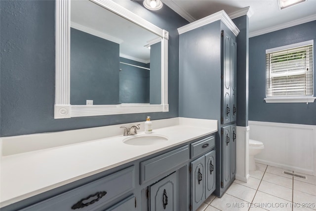 full bath with toilet, crown molding, tile patterned flooring, and vanity