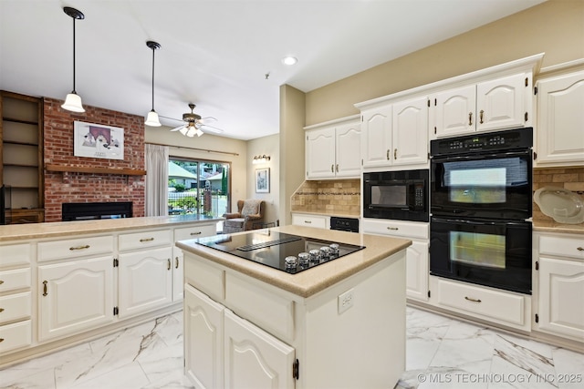 3805 E 64th Pl, Tulsa, OK 74136 - kitchen featuring black appliances, light marble finish floors, a ceiling fan, a center island, and recessed lighting