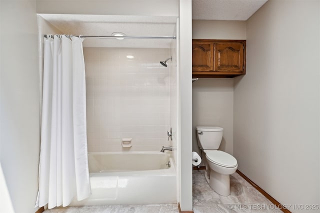 3805 E 64th Pl, Tulsa, OK 74136 - bathroom with toilet, shower / bath combo with shower curtain, and baseboards