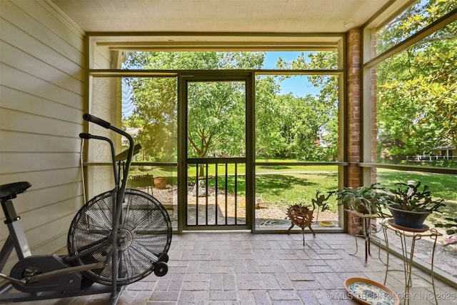 3805 E 64th Pl, Tulsa, OK 74136 - sunroom featuring healthy amount of natural light and view of scattered trees