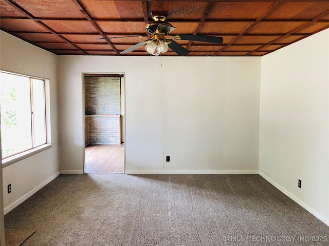 509 N Michigan Ave, Cushing, OK 74023 - carpeted empty room with a ceiling fan and baseboards