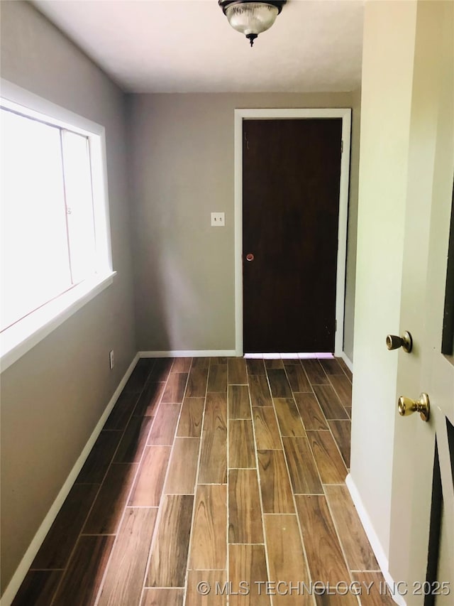 509 N Michigan Ave, Cushing, OK 74023 - entrance foyer with wood finish floors and baseboards