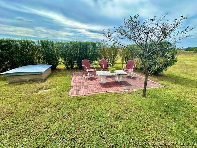 27414 S 4440th Rd, Vinita, OK 74301 - view of green lawn with a patio