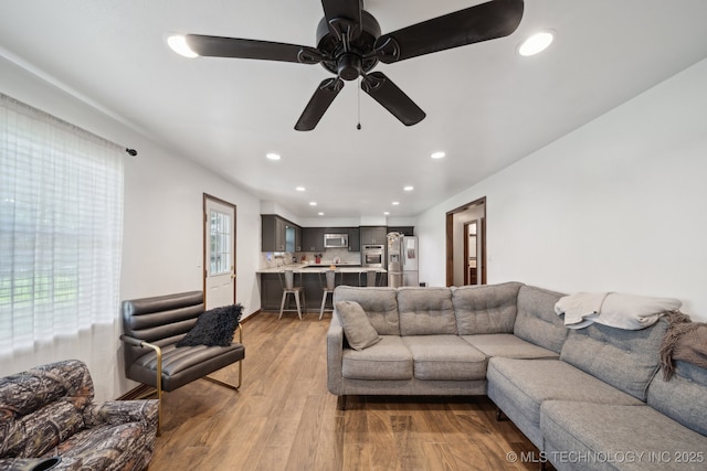 215 Rodman Cir, Muskogee, OK 74403 - living area with recessed lighting, wood finished floors, and ceiling fan