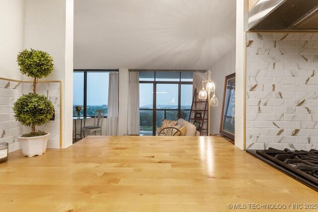 410 W 7th St Unit 1722, Tulsa, OK 74119 - dining room featuring wood finished floors