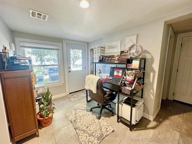 321 W Shawnee St, Tahlequah, OK 74464 - office space featuring tile patterned floors and baseboards