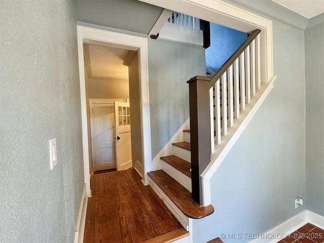 525 W Downing St, Tahlequah, OK 74464 - stairway featuring baseboards, ornamental molding, wood finished floors, and a textured wall