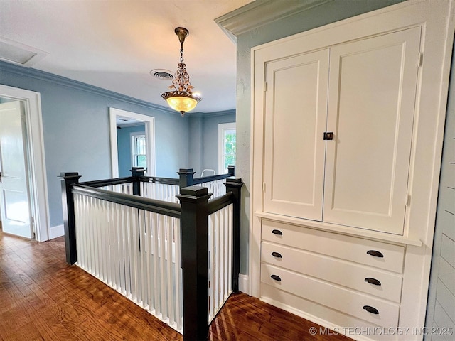 525 W Downing St, Tahlequah, OK 74464 - hall featuring crown molding, dark wood-style floors, an upstairs landing, and baseboards