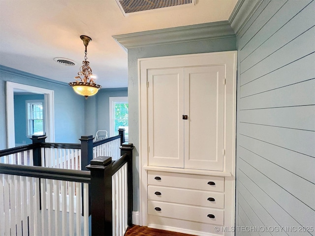 525 W Downing St, Tahlequah, OK 74464 - stairs with crown molding and wood walls