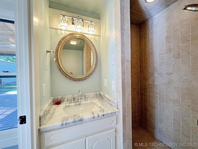 525 W Downing St, Tahlequah, OK 74464 - bathroom featuring tiled shower and vanity