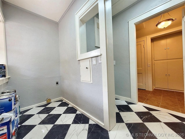 525 W Downing St, Tahlequah, OK 74464 - clothes washing area featuring hookup for an electric dryer, baseboards, and a textured wall