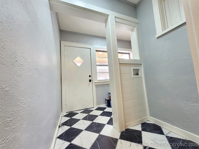 525 W Downing St, Tahlequah, OK 74464 - entryway with a textured wall, baseboards, and tile patterned floors