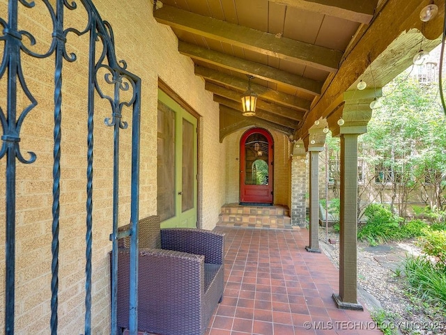 property entrance with stucco siding