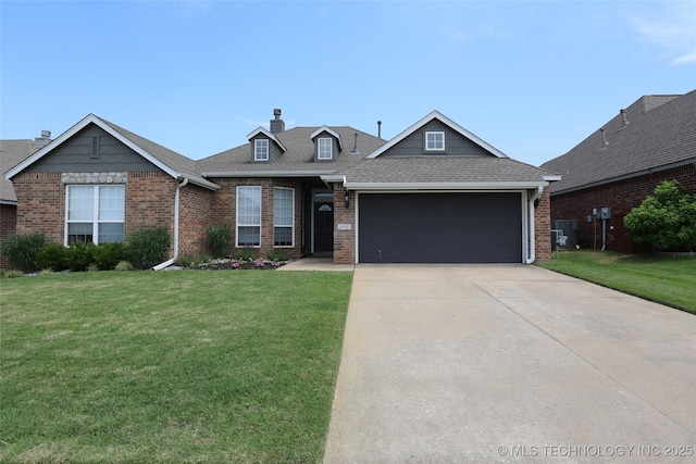 3983 S 216th E Ave, Broken Arrow, OK 74014 - view of front of property with brick siding, a front yard, an attached garage, and concrete driveway