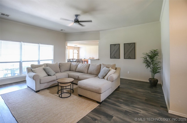 3983 S 216th E Ave, Broken Arrow, OK 74014 - living area with a ceiling fan, dark wood-style flooring, baseboards, and crown molding