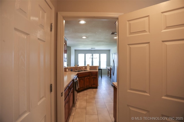 3983 S 216th E Ave, Broken Arrow, OK 74014 - corridor with a sink, light tile patterned floors, and recessed lighting