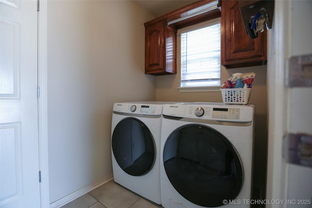3983 S 216th E Ave, Broken Arrow, OK 74014 - laundry area with separate washer and dryer, cabinet space, light tile patterned floors, and baseboards