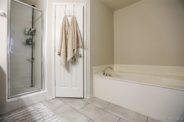 3983 S 216th E Ave, Broken Arrow, OK 74014 - bathroom featuring tile patterned floors, a stall shower, a bath, and baseboards