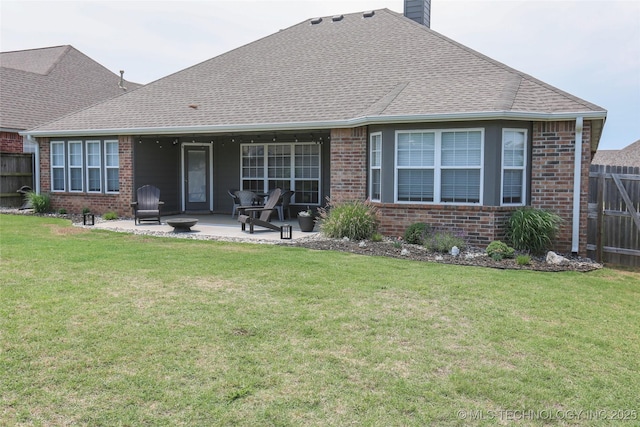 3983 S 216th E Ave, Broken Arrow, OK 74014 - rear view of house featuring brick siding, a chimney, a patio area, and roof with shingles