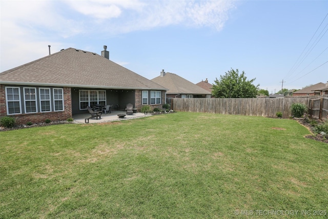 3983 S 216th E Ave, Broken Arrow, OK 74014 - rear view of house with a patio, brick siding, roof with shingles, and a chimney