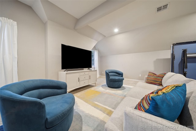 living area featuring vaulted ceiling, baseboards, and carpet flooring