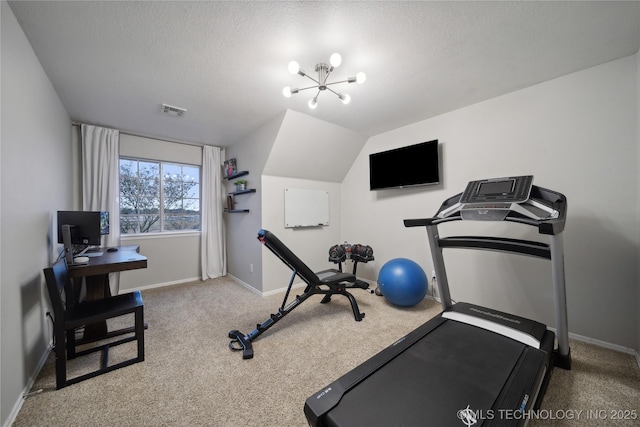 exercise room featuring carpet flooring, baseboards, a textured ceiling, and vaulted ceiling