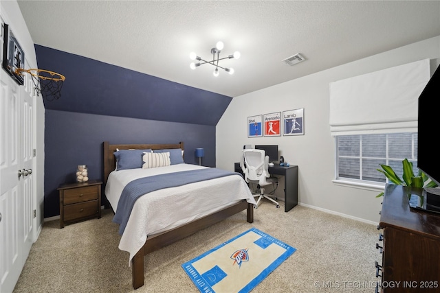 bedroom featuring carpet flooring, vaulted ceiling, baseboards, and a textured ceiling