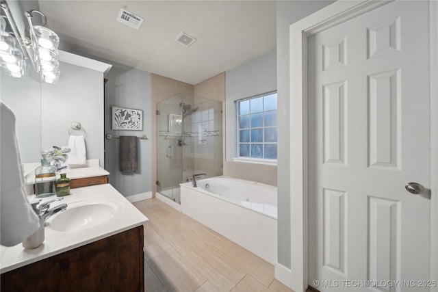 full bath with a garden tub, a stall shower, double vanity, and baseboards