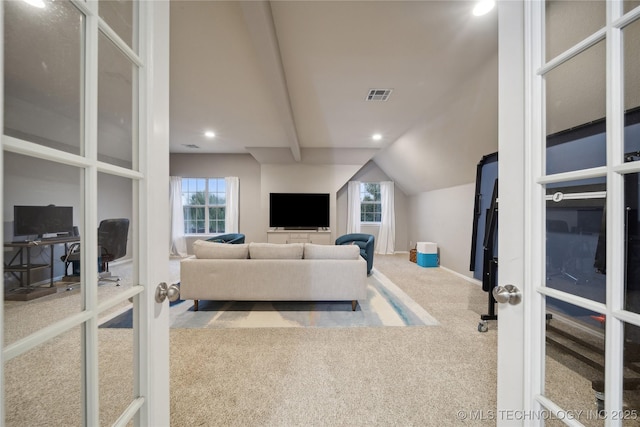 carpeted living area featuring lofted ceiling, french doors, baseboards, and recessed lighting