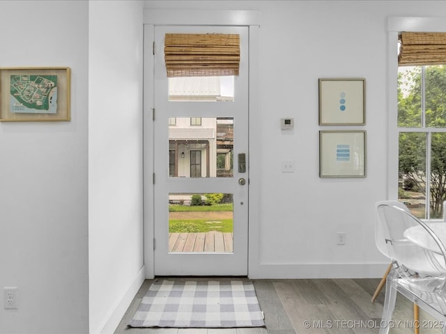 40 Center Ln N, Carlton Landing, OK 74432 - doorway featuring light wood-type flooring and baseboards