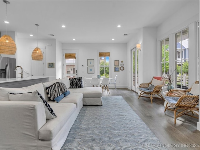 40 Center Ln N, Carlton Landing, OK 74432 - living area featuring wood finished floors and recessed lighting