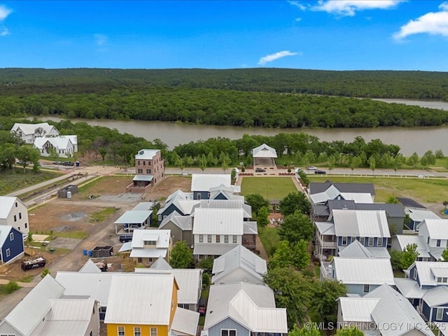 40 Center Ln N, Carlton Landing, OK 74432 - aerial view of residential area with a forest and a nearby body of water