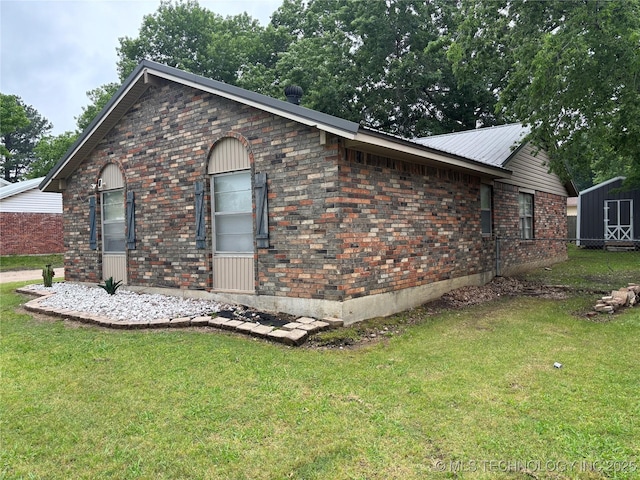 316 Barclay, Muskogee, OK 74403 - view of side of property featuring brick siding and metal roof