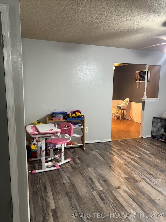 316 Barclay, Muskogee, OK 74403 - dining space featuring wood finished floors and a textured ceiling