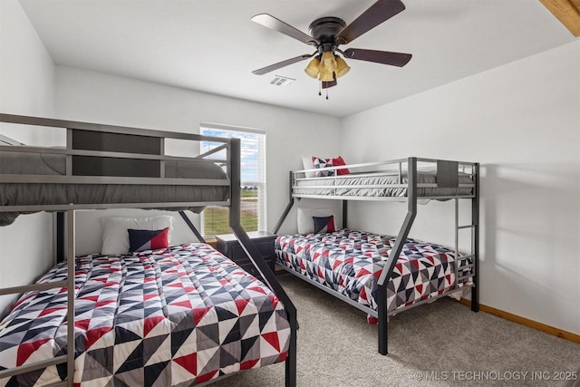 11879 Sandy Acres Trl, Kingston, OK 73439 - carpeted bedroom featuring baseboards and ceiling fan