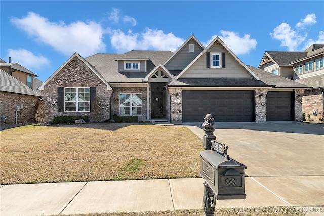 5412 E 122nd St S, Bixby, OK 74008 - craftsman-style house featuring brick siding, a front yard, driveway, roof with shingles, and an attached garage