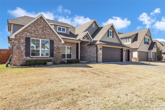 5412 E 122nd St S, Bixby, OK 74008 - craftsman house featuring brick siding, concrete driveway, an attached garage, and a shingled roof
