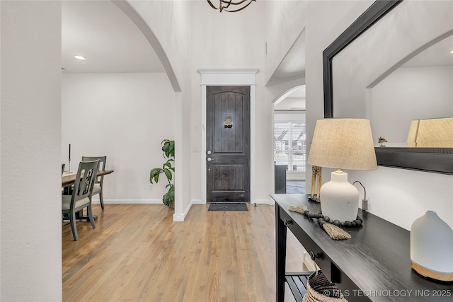 5412 E 122nd St S, Bixby, OK 74008 - home office featuring arched walkways, light wood-style flooring, baseboards, and recessed lighting