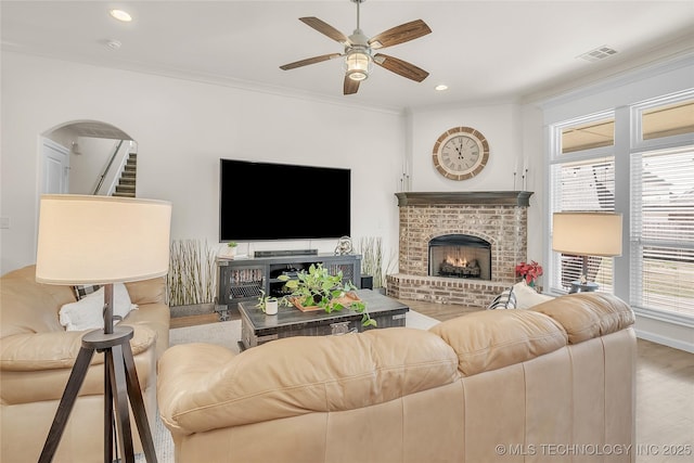 5412 E 122nd St S, Bixby, OK 74008 - living area with ceiling fan, wood finished floors, ornamental molding, a fireplace, and recessed lighting