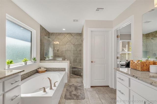 5412 E 122nd St S, Bixby, OK 74008 - full bath featuring a walk in shower, vanity, a bath, and tile patterned flooring