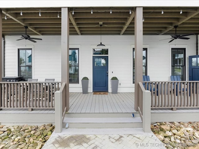 42 Redbud St, Carlton Landing, OK 74432 - view of exterior entry with ceiling fan and a porch