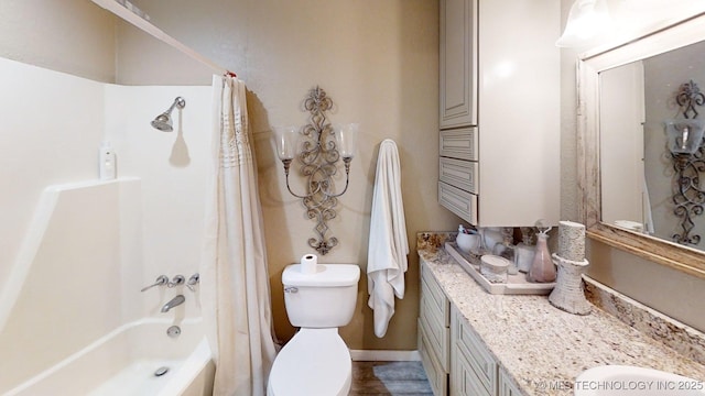 196 High Chaparal St, Ardmore, OK 73401 - bathroom featuring toilet, shower / bath combo, and double vanity